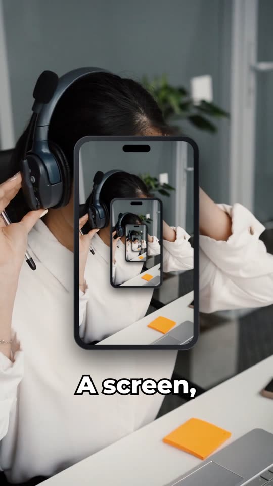 A phone in the middle of the picture showing the same scene, with a smaller phone inside it.