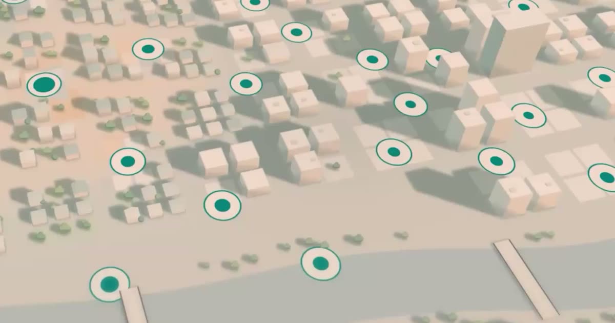 A still from Anthropic's announcement video: an animated 3D map of a small town at dawn with round green bike-share stations.